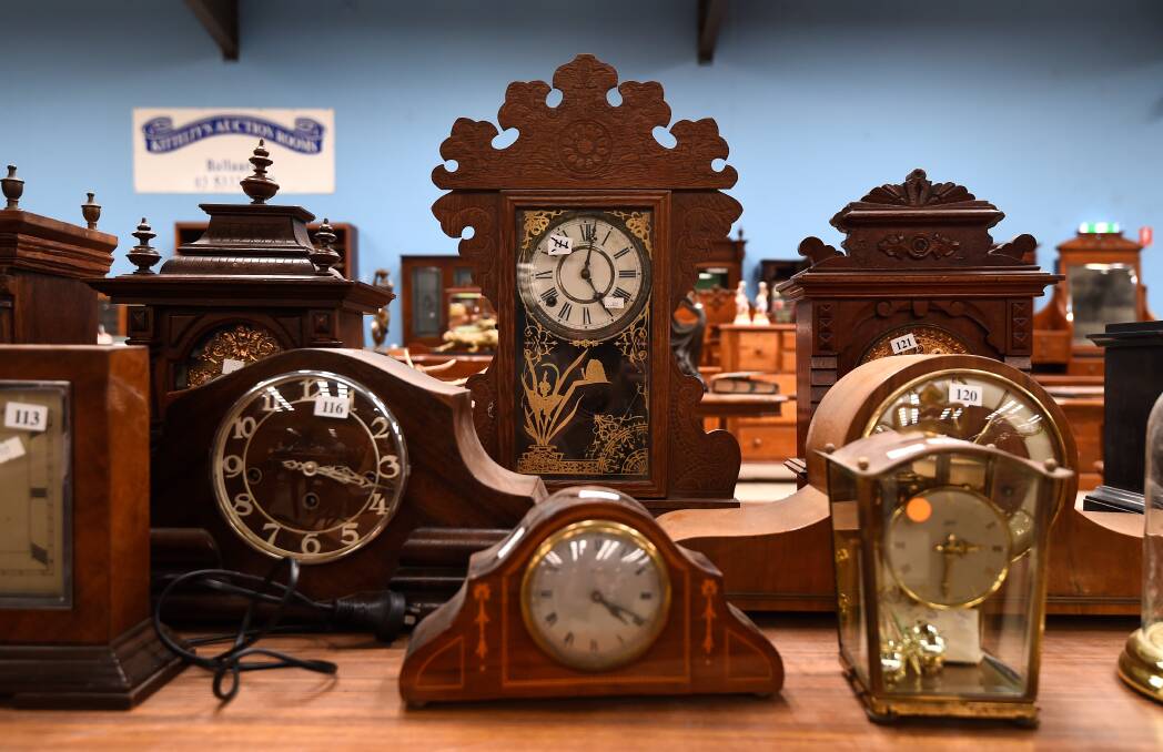 CALLING TIME: This collection of antique clocks are among the items up for auction this weekend. Picture: Adam Trafford. 