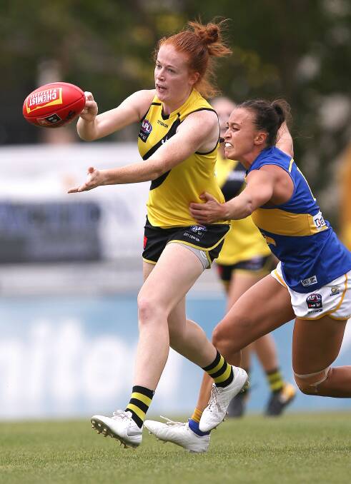 ON CUSP: New Tiger Sophie Molan wins the ball during training at Punt Road Oval. Picture supplied