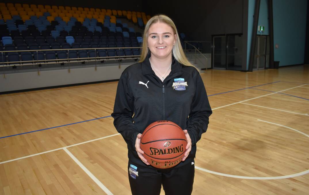INNOVATOR: Chloe Dunmore showcases Basketball Ballarat's updated off-court referee uniforms. Picture: Basketball Ballarat