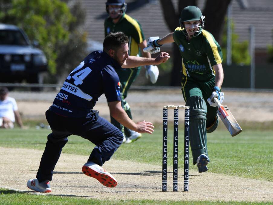 CLOSE: Mt Clear's Jarrod Burnes tries to dismiss Jayden Hayes of Ballarat Redan in the first innings of a twenty20 clash. Picture: Lachlan Bence