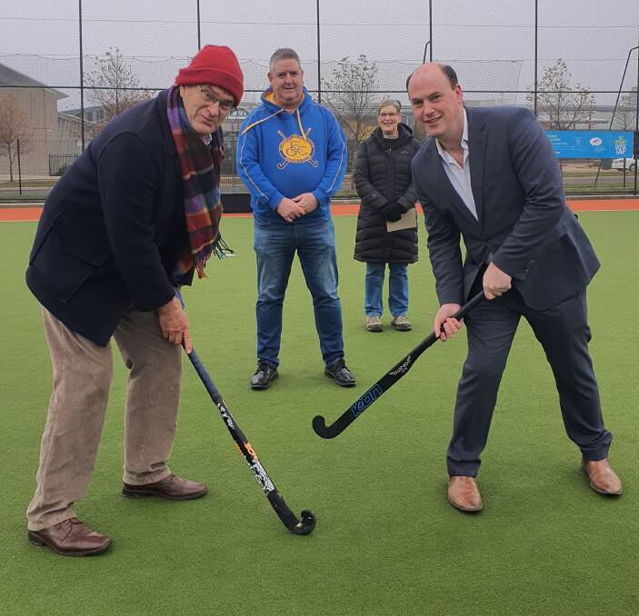 SEASON CEMENTED: Hockey Ballarat president Tony Ford with Lauchlan Waddell, Jeff Sly of Eureka-Golden City Hockey Club, and WestVic representative Helen Ramsay. Picture: Kyle Evans