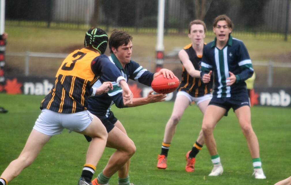 PUSH: St Patrick's College Cooper Craig-Peters forces the ball to help his side advance to the final of the Herald Sun Cup final. Picture: Contributed 