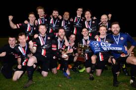 CHAMPS: Daylesford-Hepburn United celebrates after capturing the BDSA division one open cup for the first time since 2001. Picture: Adam Trafford