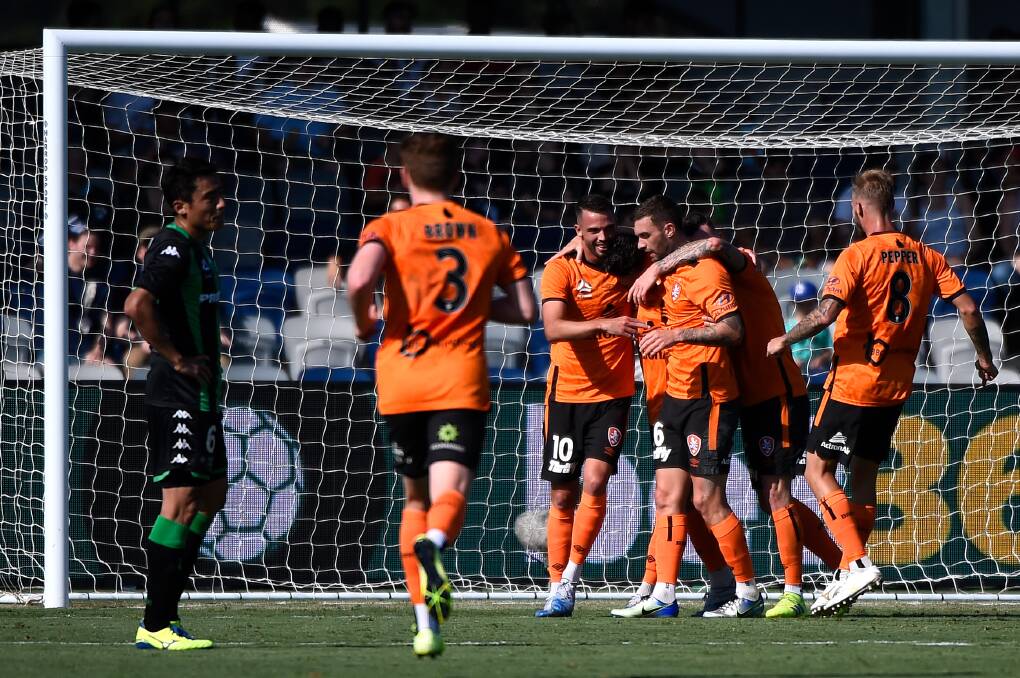 SEALER: Brisbane Roar players celebrate during the club's 1-0 victory over Western United at Mars Stadium. Picture: Adam Trafford 