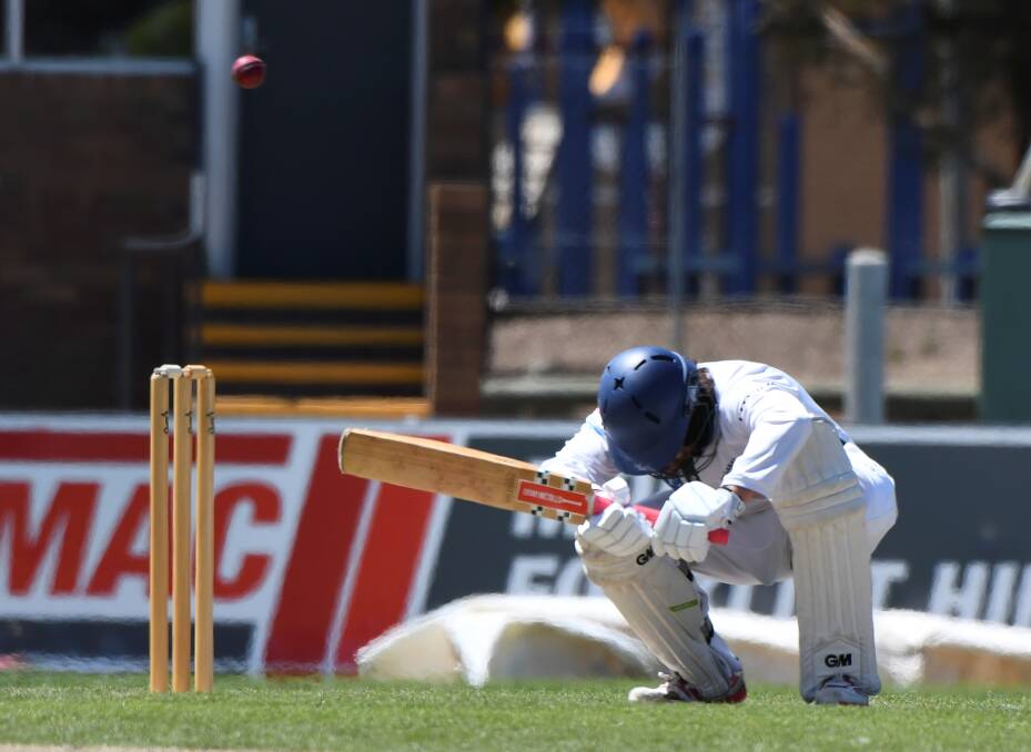COMING IN HOT: Ballarat-Redan batsman Billy Jones ducks for cover in his side's loss to Mt Clear.