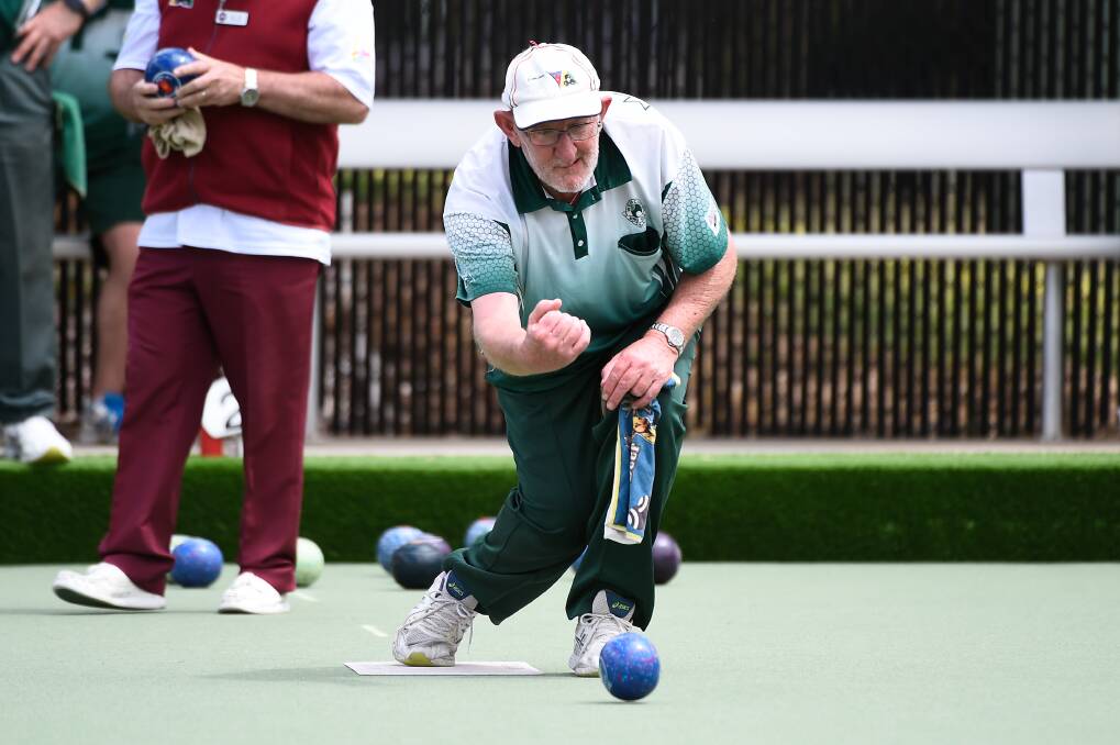 SPIN: Jeff Greive of Webbcona lets one fly down the green in his side's impressive win over the defending premier.