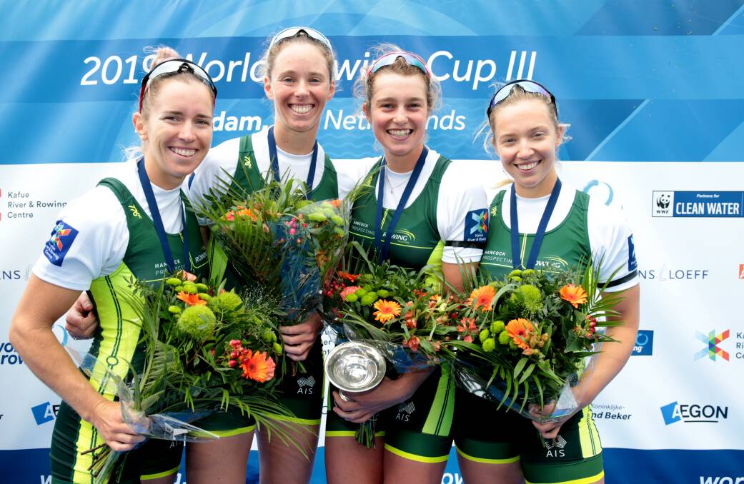 GOLD STANDARD: Ballarat exports Lucy Stephan and Katrina Werry take to the podium after winning gold in the women's four at the 2019 World Rowing Cup. Picture: Rowing Australia