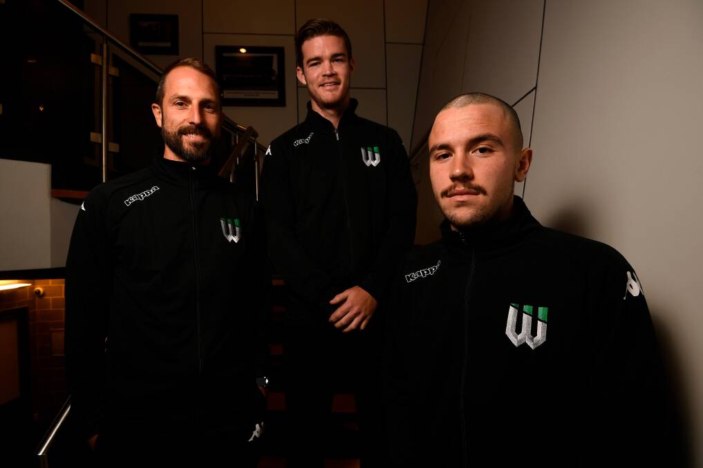 GUNS: Andrew Durante, Connor Chapman and Apostolos Stamatelopoulos pose for a photo during the Western United Football Club fan meet-and-greet at Morshead Park.