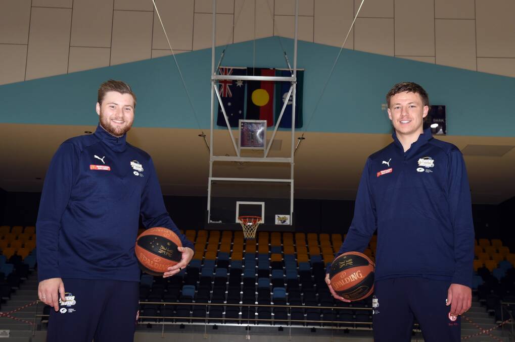 LOOKING AHEAD: Ballarat Miners youth player Ethan Fiegert (right) with Miners youth co-coach Ryan McKew at the Ballarat Sports and Events Centre. Picture: Kate Healy