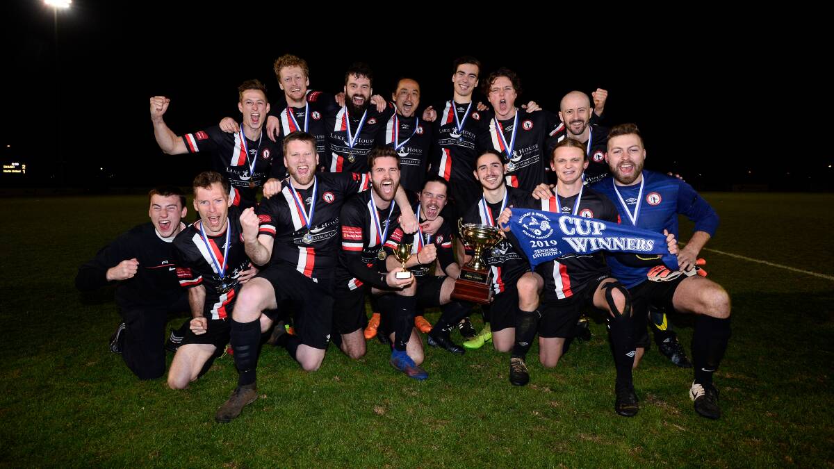 CHAMPS: Daylesford-Hepburn United celebrate after capturing the BDSA division one open cup for the first time since 2001. Picture: Adam Trafford 