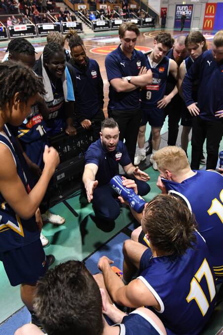 STAY FOCUSED: Youth Miners head coach Daniel Knaggs motivates his team in game two of the Big V youth one men's finals against Geelong. Picture: Lachlan Bence 