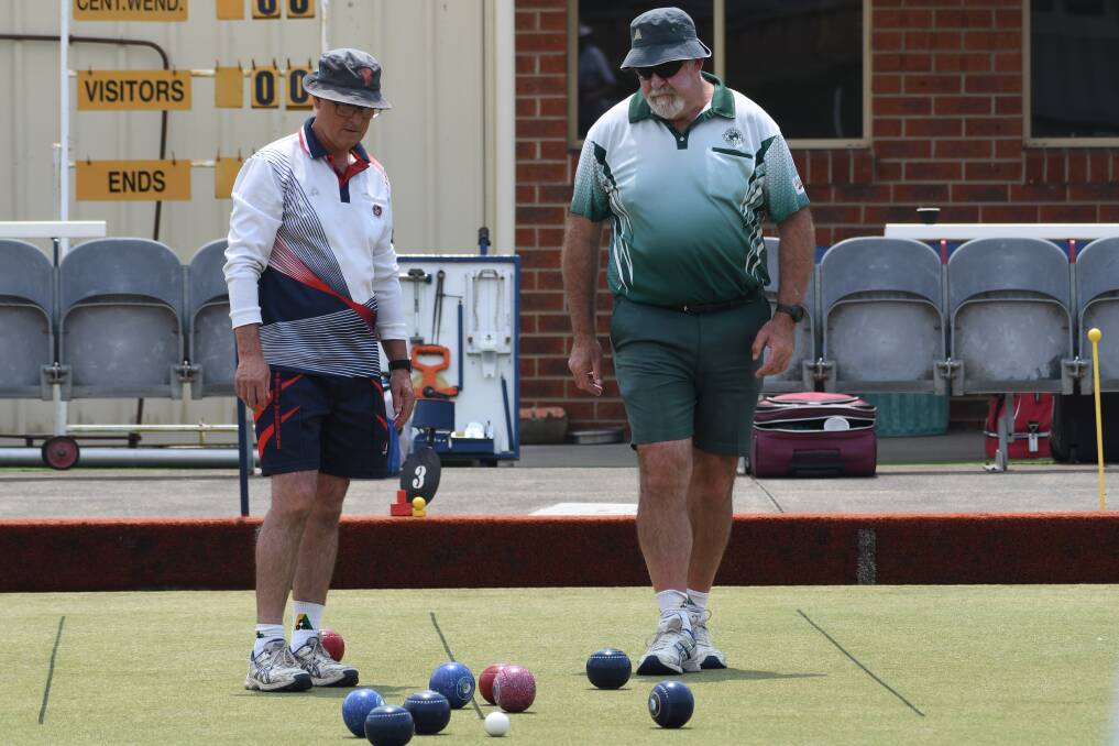 YOUR MOVE: Skippers Michael Kennedy (Central Wendouree) and Tony Lange (Webbcona) taking measure of the situation.