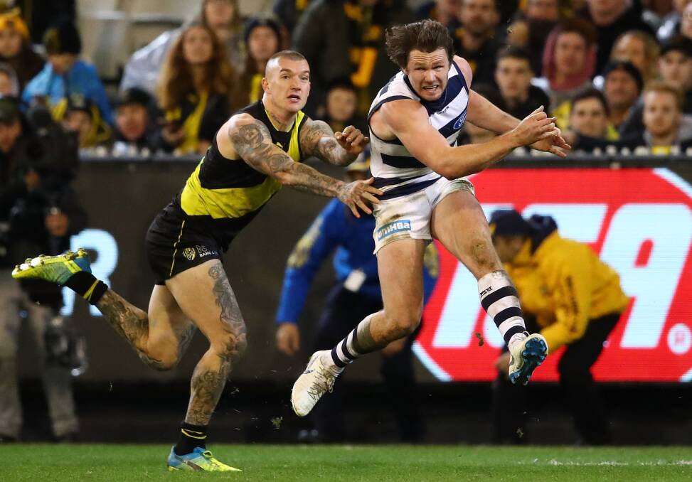 RIVALRY: Richmond's Dustin Martin (left) and Geelong's Patrick Dangerfield will carry the hopes of their fans on their shoulders on Saturday night. Picture: Getty Images