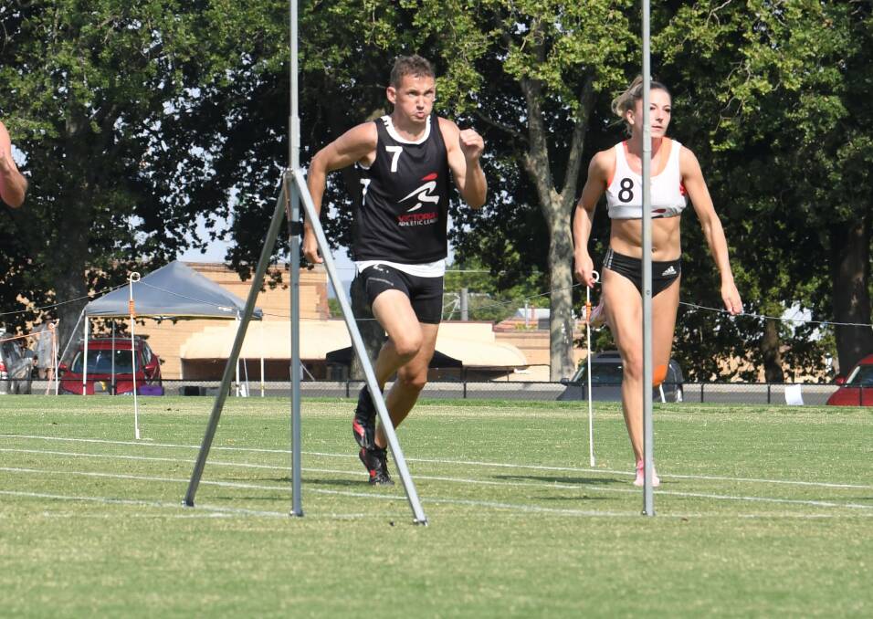 OLD-TIMER: Daniel Martin crosses the line first in 70-metre dash at Ballarat Gift. Picture: Lachlan Bence