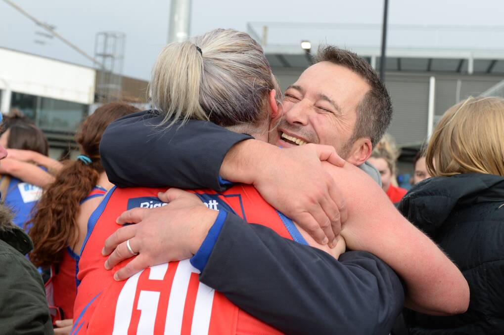 MEMORIES: Gary Cooke embraces Katie Lindkvist after winning the CHNL A-Grade grand final in 2019. Picture: Kate Healy