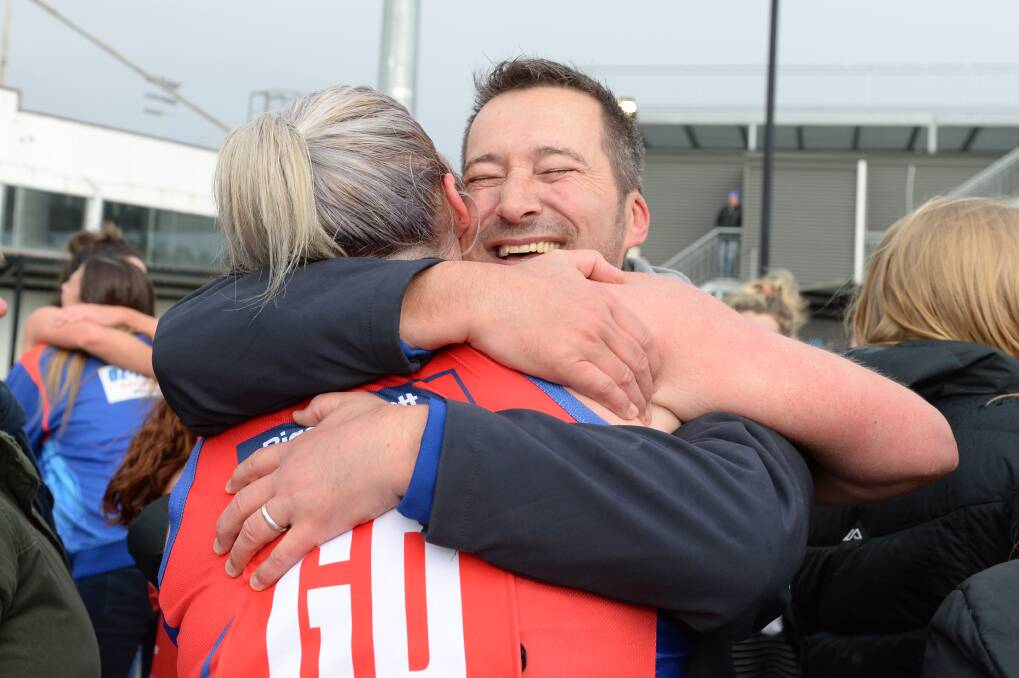 CHAMPS: Hepburn's Katie Lindkvist embraces and Gary Cooke following win. Picture: Kate Healy