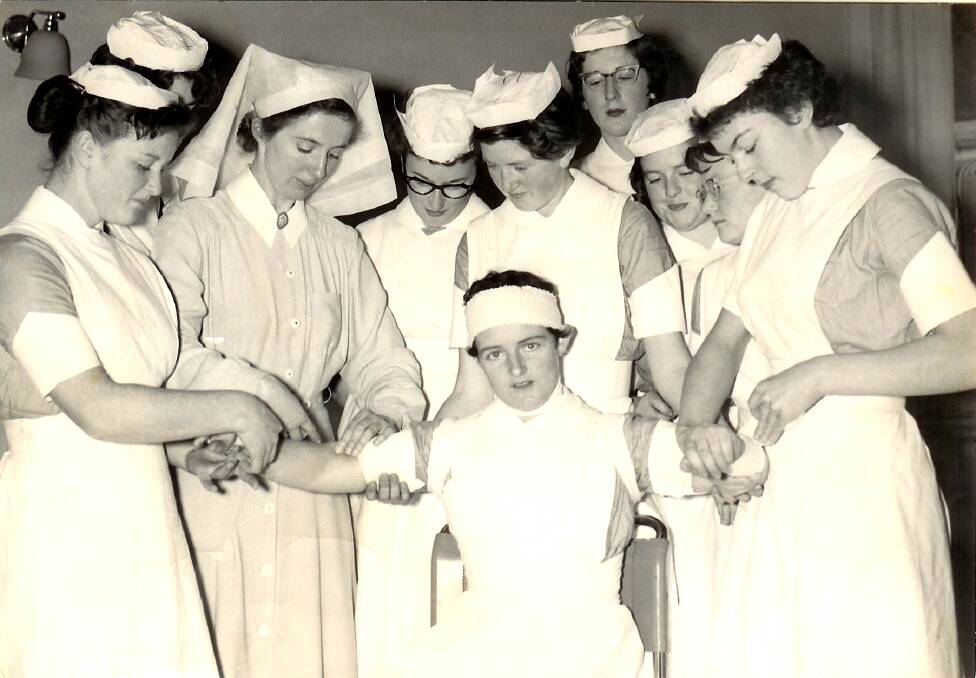 Ballarat trainee nurses practise in a bandaging class in 1958. Photo: Supplied