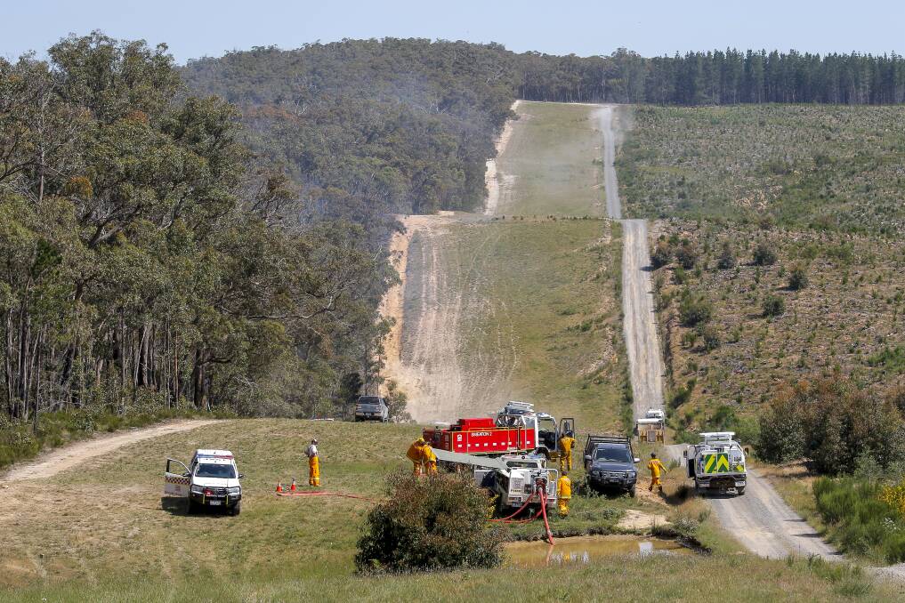 Emergency services join fire crews at Creswick where two fires were burning on Sunday afternoon. Photo: Dylan Burns 