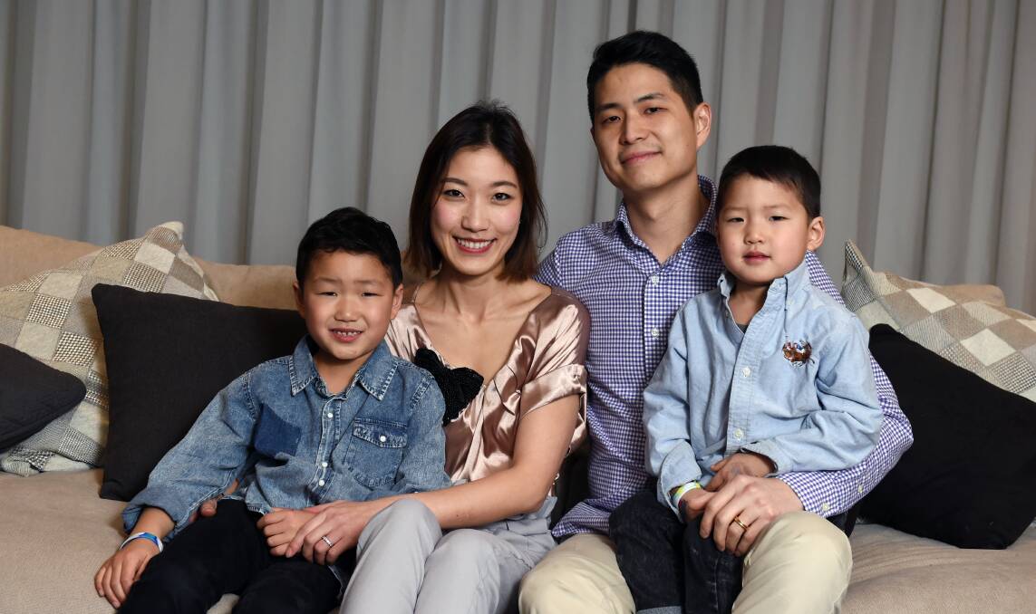Jessica and John Lim with their sons, Jayden and Toby. Photo: Kate Healy