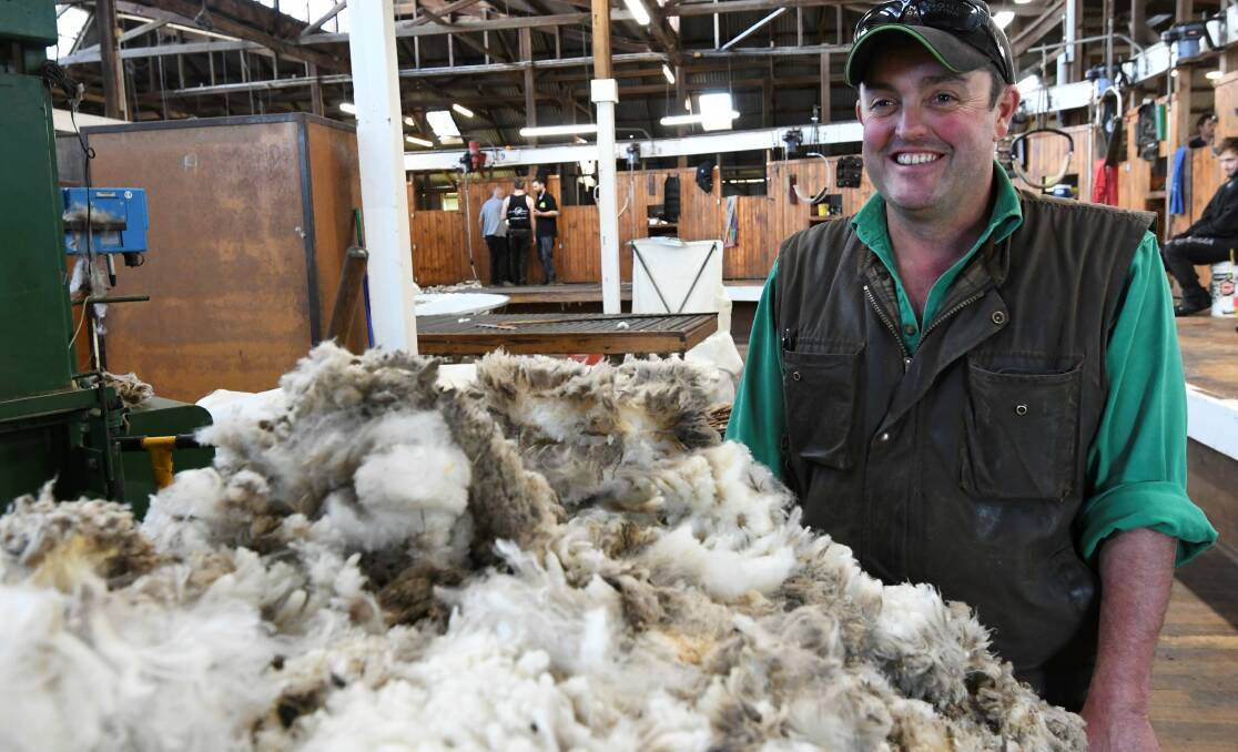 RESULTS: Banongil stock manager Sean Carroll is pleased with the increasing trend in wool prices and hopes it will continue. Photo: Lachlan Bence