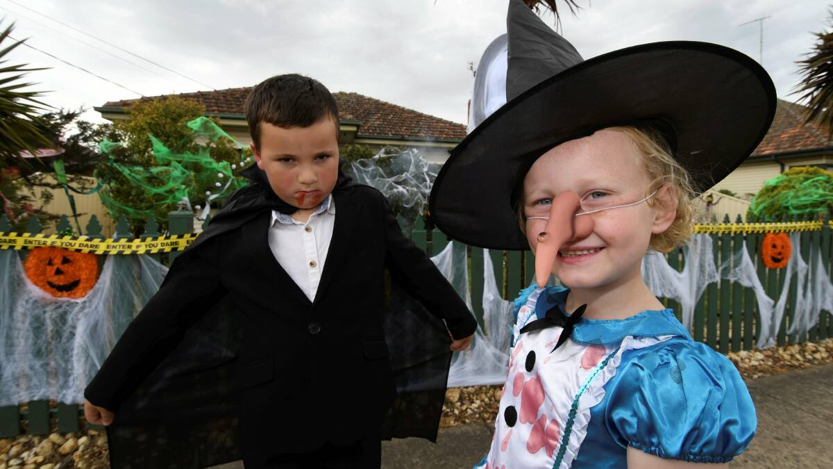FUN: Celebrating Halloween in Norman St are Deklyn, 6, and Savannah Turner, 5.
Photo: Lachlan Bence