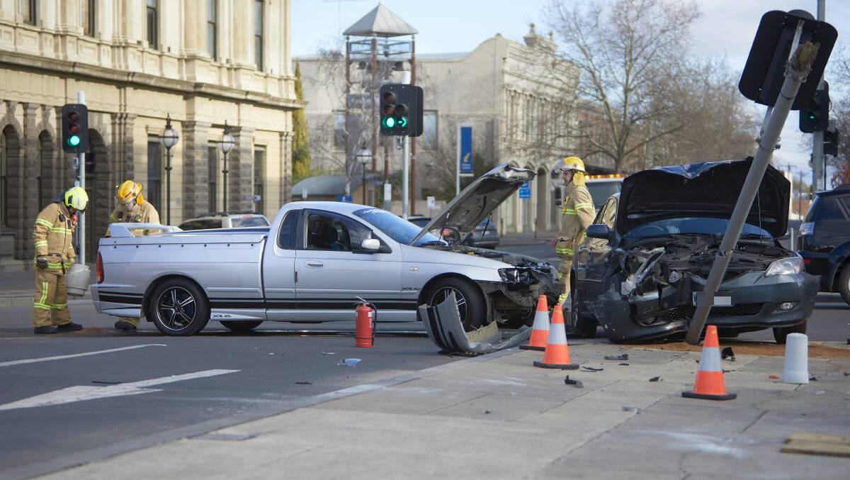 Police and CFA attend a two-car collision in Sturt Street on Saturday. Photo: Luka Kauzlaric