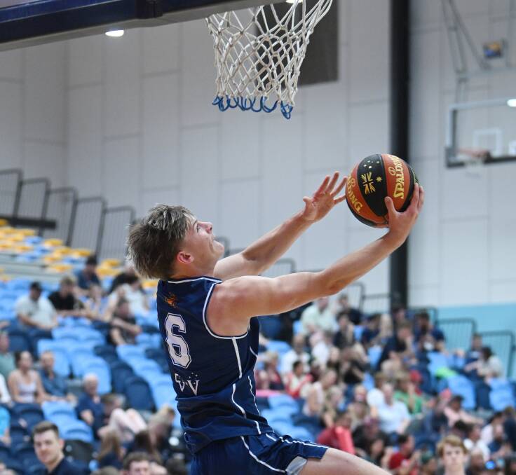 Ned Renfree goes to the basket for Victoria in the National Under-20 Basketball Championships in Ballarat on Sunday. Picture by Kate Healy.