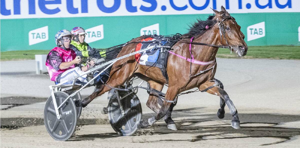 IN THE RED: Ladies In Red (David Moran) gets the edge in the group 1 $300,000 Breeders Crown 2yo pacing fillies final. Picture: Stuart McCormick