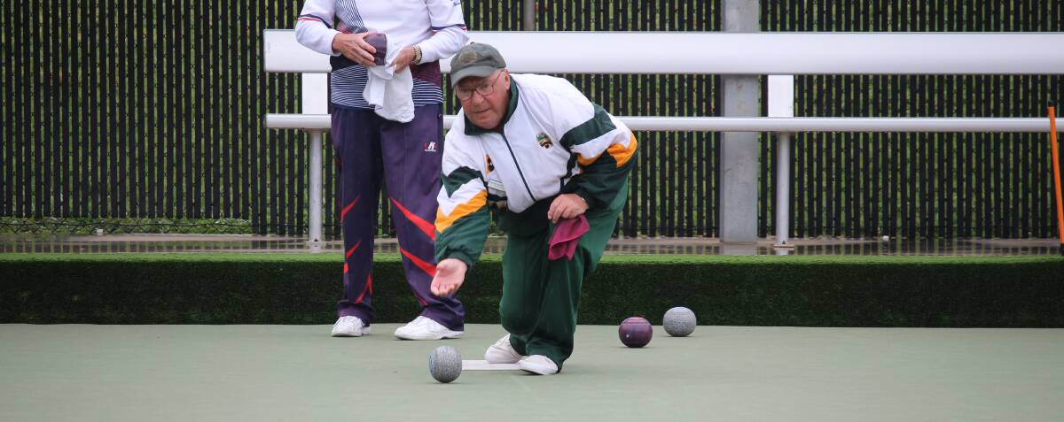 PROGRESSING: Avenue's Pat McSherry on his way to a win on the first day of the BDBD over-60 men's singles championship at BMS. Picture: Anthony McCabe   