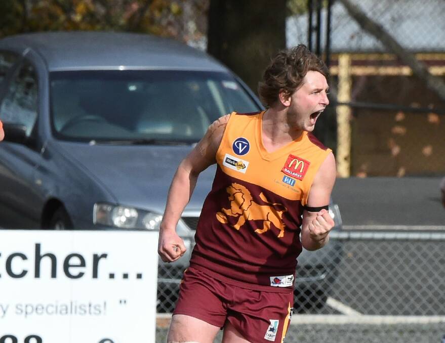 PUMPED: Mitch Phelps celebrates one of his four goals for Redan against North Ballarat City. Picture: Lachlan Bence