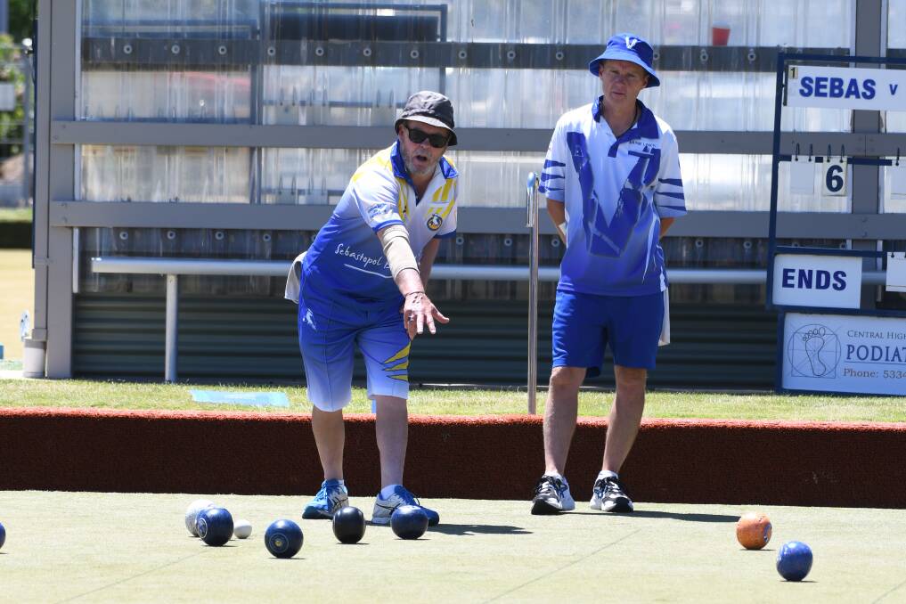 THIS SIDE OF THE HEAD: Sebastopol skipper Murray Gannon gives instructions while Wayne Lynch (Victoria) watches on. Picture: Kate Healy