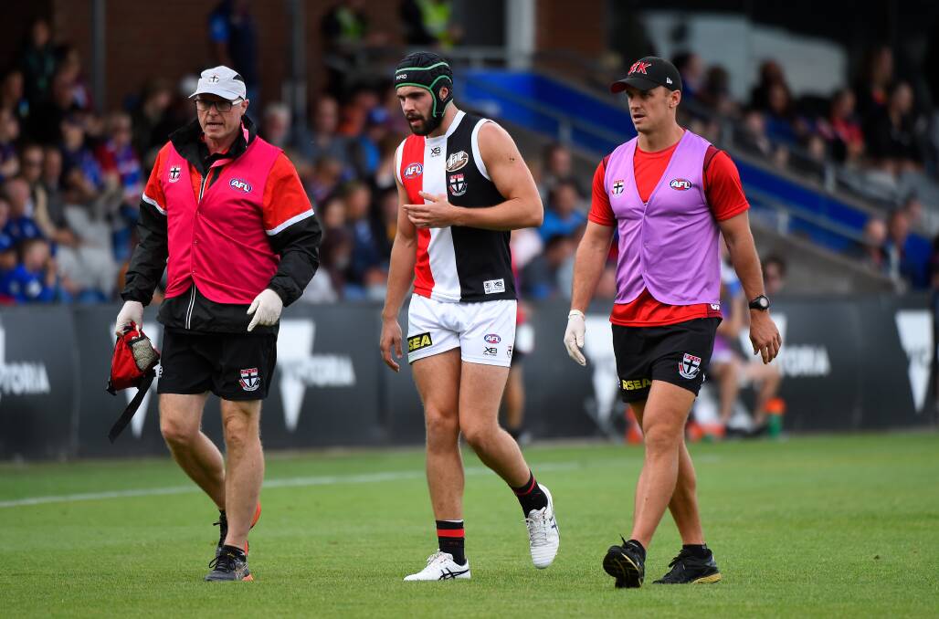 OUT: St Kilda's Paddy McCartin leaves the ground after bneing concussed against Western Bulldogs in Ballarat.