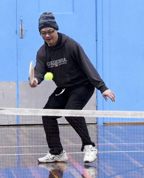 TEEING UP: Michael Tee on court for pickleball in the first week of return to play at Ken Kay Badminton Stadium. Picture: Lachlan Bence