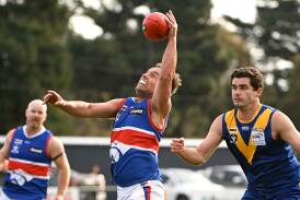 Daylesford recruit Trent Lee take possession in front of Dylan Harberger (Learmonth) at Learmonth on Saturday. Picture by Adam Trafford.