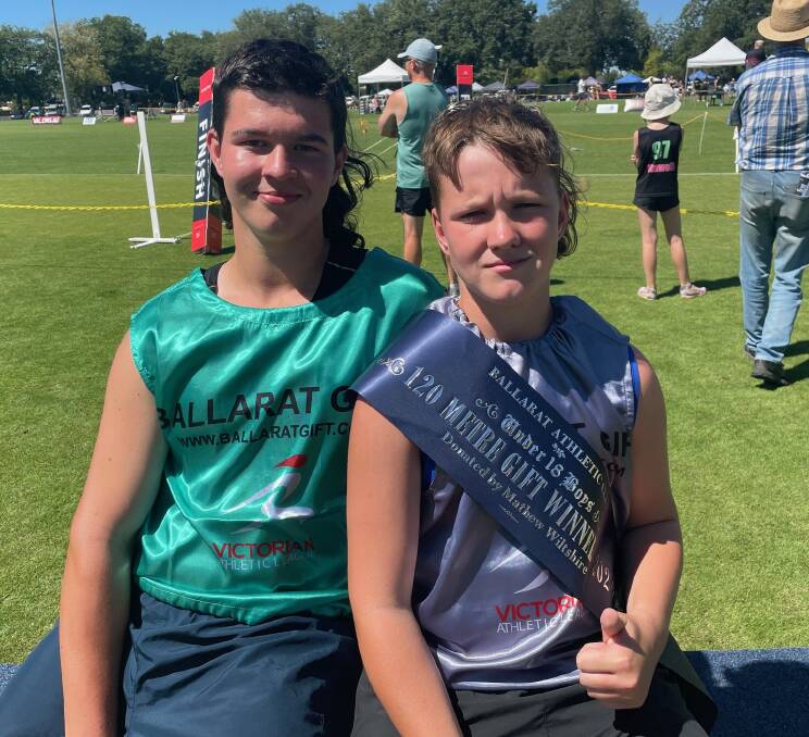 Jack Kinnersly proudly wears the Ballarat under-18 boys' 120m sash after a narrow win over his older brother Lachlan on Sunday.