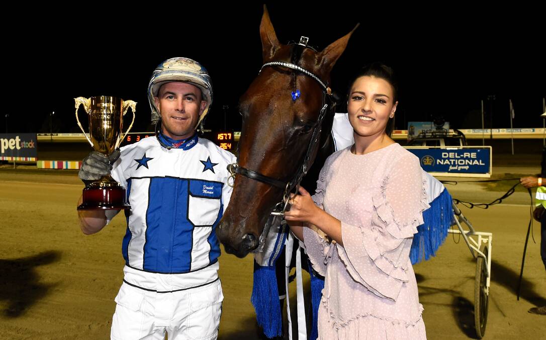 BIG TIME: Kialla trainer-driver David Moran and his partner Kasey Kent celebrate winning the Ballarat Pacing Cup with Lochinvar Art. Pictures: Adam Trafford