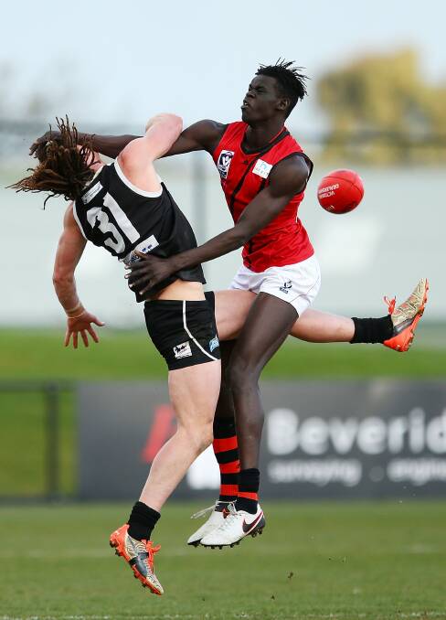 Gach Nyuon rucking for Essendon against North Ballarat Roosters. Picture: Getty Images