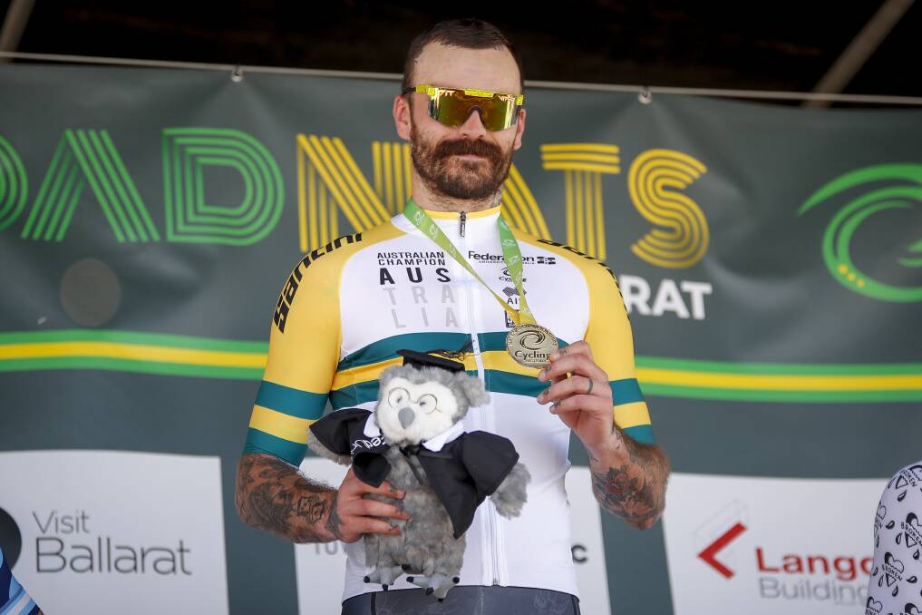 PROUD: Hal Hunter (Brunswick) with his men's fixed gear gold medal in the Ballarat central business district on Friday. Picture: Dylan Burns
