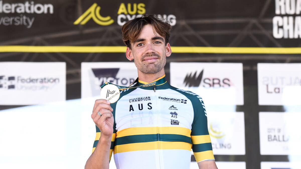 Allister Mackellar with his national under-23 road race gold medal, and green and gold jersey. Picture by Adam Trafford.