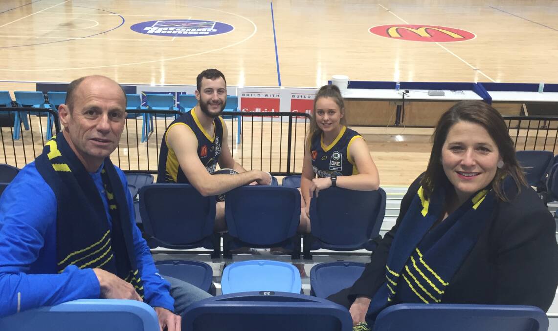 FANS: Miners number one ticket holder Steve Moneghetti and Rush number one ticket Juliana Addison with Ballarat NBL1 player Jordan Lingard and Claire Constable.