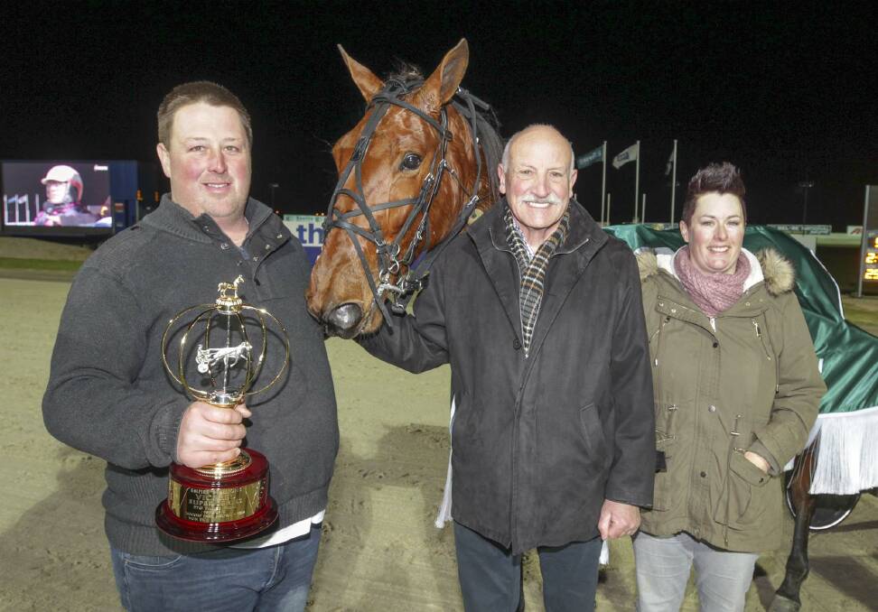 WINNING COMBINATION:l Trainers Clayon Tonkin, left, and Emma Stewart with Ballarat breeder/owner Bruce Edward and two-year-old filly Kualoa. Pictures: Stuart McCormick, Harness Racing Victoria