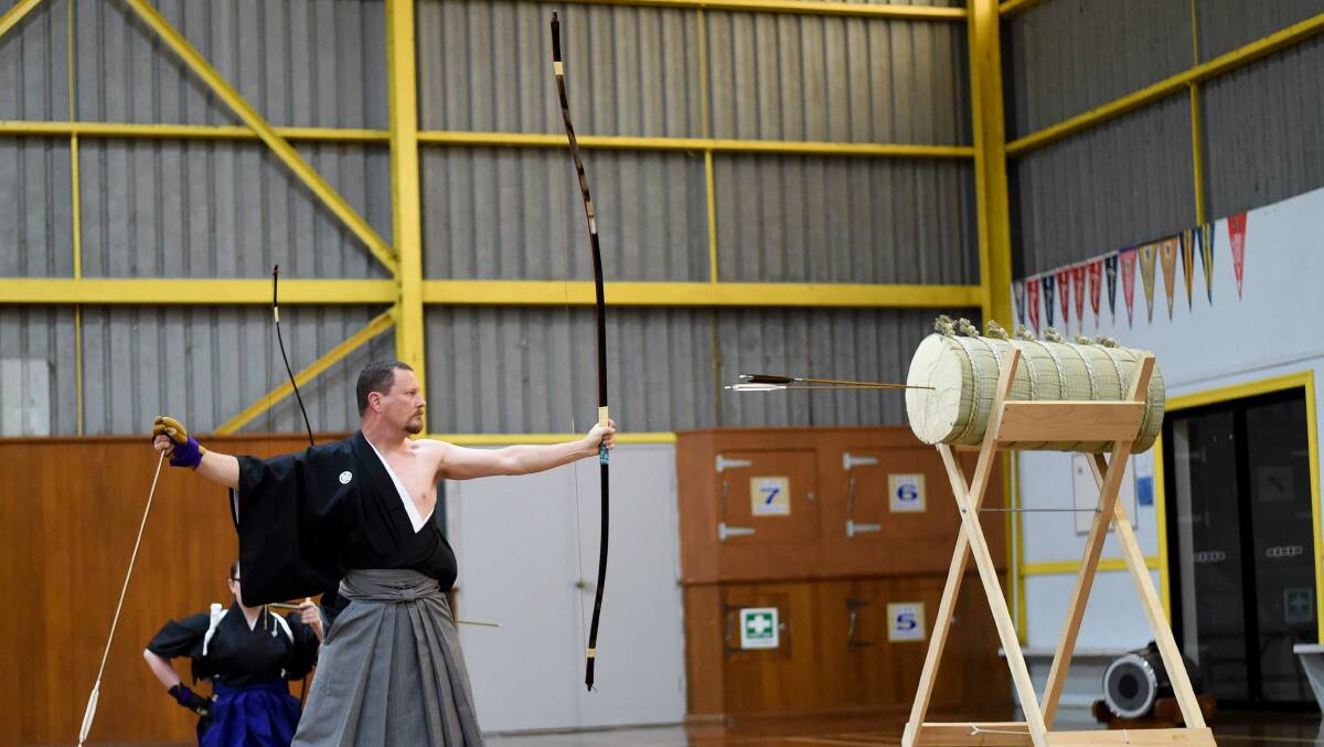 ON TARGET: Gavin Downs, of Melbourne gives a Kyudo (Japanese archery) demsonstration .
