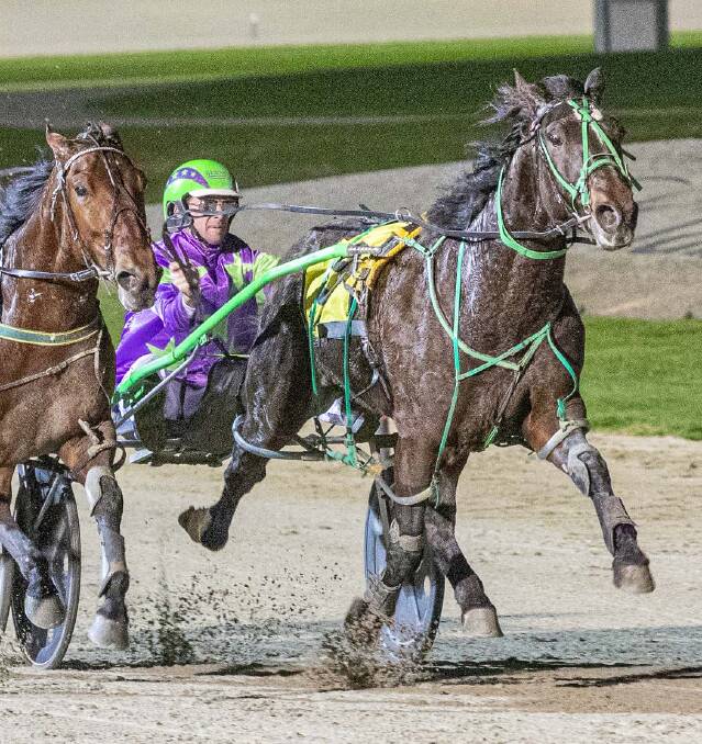 RUNNING HOT: Damien Burns urges Youraremy Sunshine to the line in a run at Melton. Picture: Stuart McCormick 