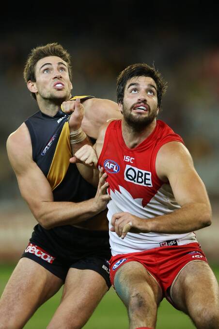 ANOTHER RECRUIT: Melton South's latest recruit Tom Derickx, right, battles with Shaun Hampson in his Sydney Swans days. Picture: Getty Images