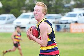 Carngham-Linton signing Sam Hopper in Leeton colours. Picture by Wagga Daily Advertiser.