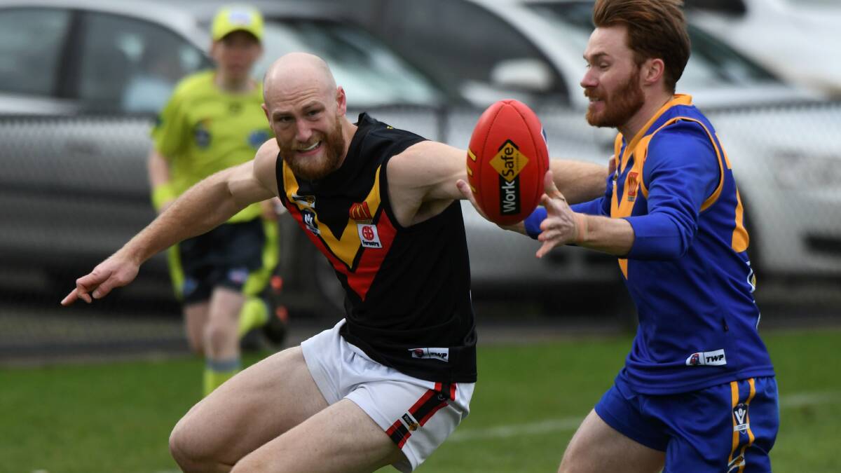 Sebastopol's Marshall Cain out-positions Bacchus Marsh onballer Harrison King at Marty Busch Reserve. Picture: Lachlan Bence