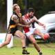 IN THE THICK OF IT; Springbank onballer Todd Finco lays a hip and shoulder bump on Creswick's Justin allison in round four. Picture: Adam Trafford.