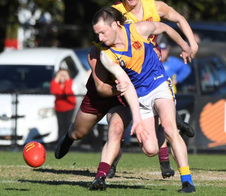 MOVER: Sebastopol's Lachie Cassidy closes in on the football against Redan at the City Oval on Saturday. Picture: Lachlan Bence