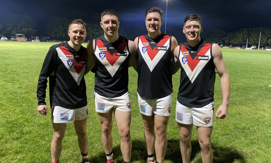 Brothers Jarrod, Nick, JustIn and Dean O'Brien savour a special moment for family and club.