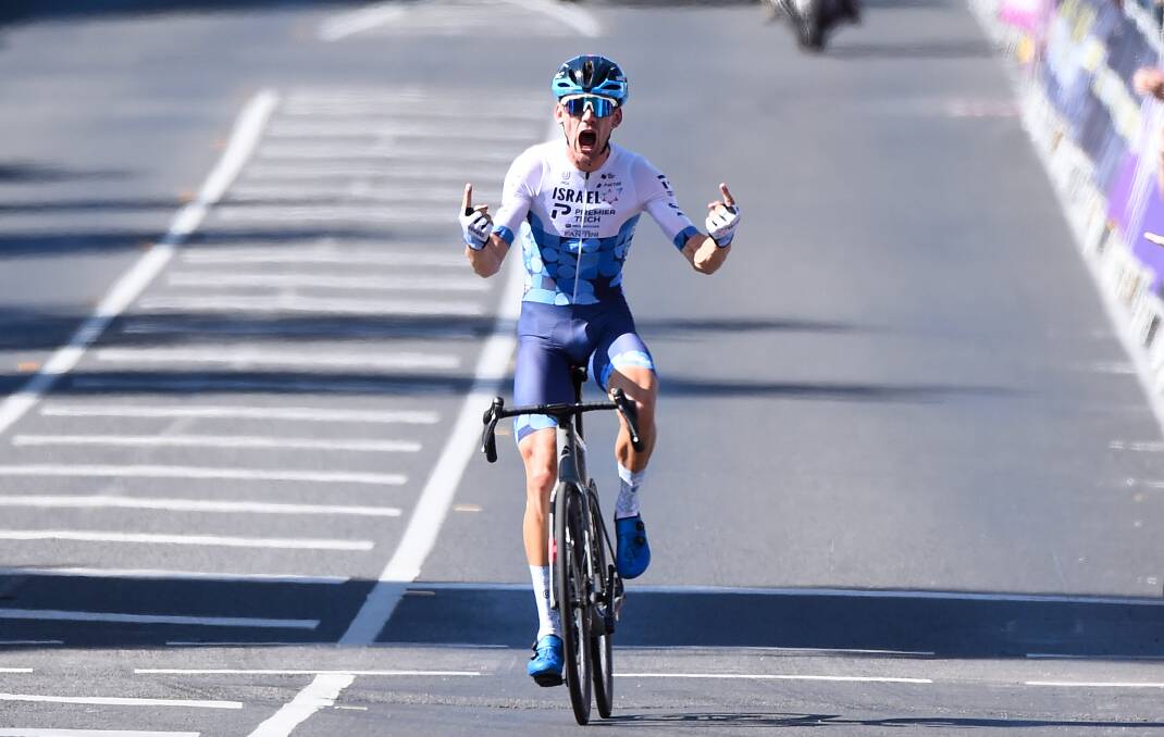 C'mon! Queenslander Alastair Mackellar yells at the top of his voice in joy as he crosses the line to win the national under-23 men's road race. Picture by Adam Trafford.